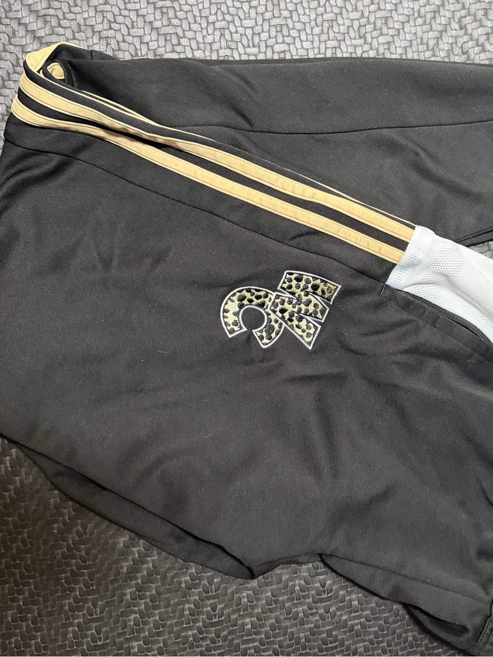 adidas Black Joggers with Gold Stripes and Leopard Logo